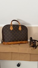 Louis Vuitton Alma PM Monogram Canvas Handbag...