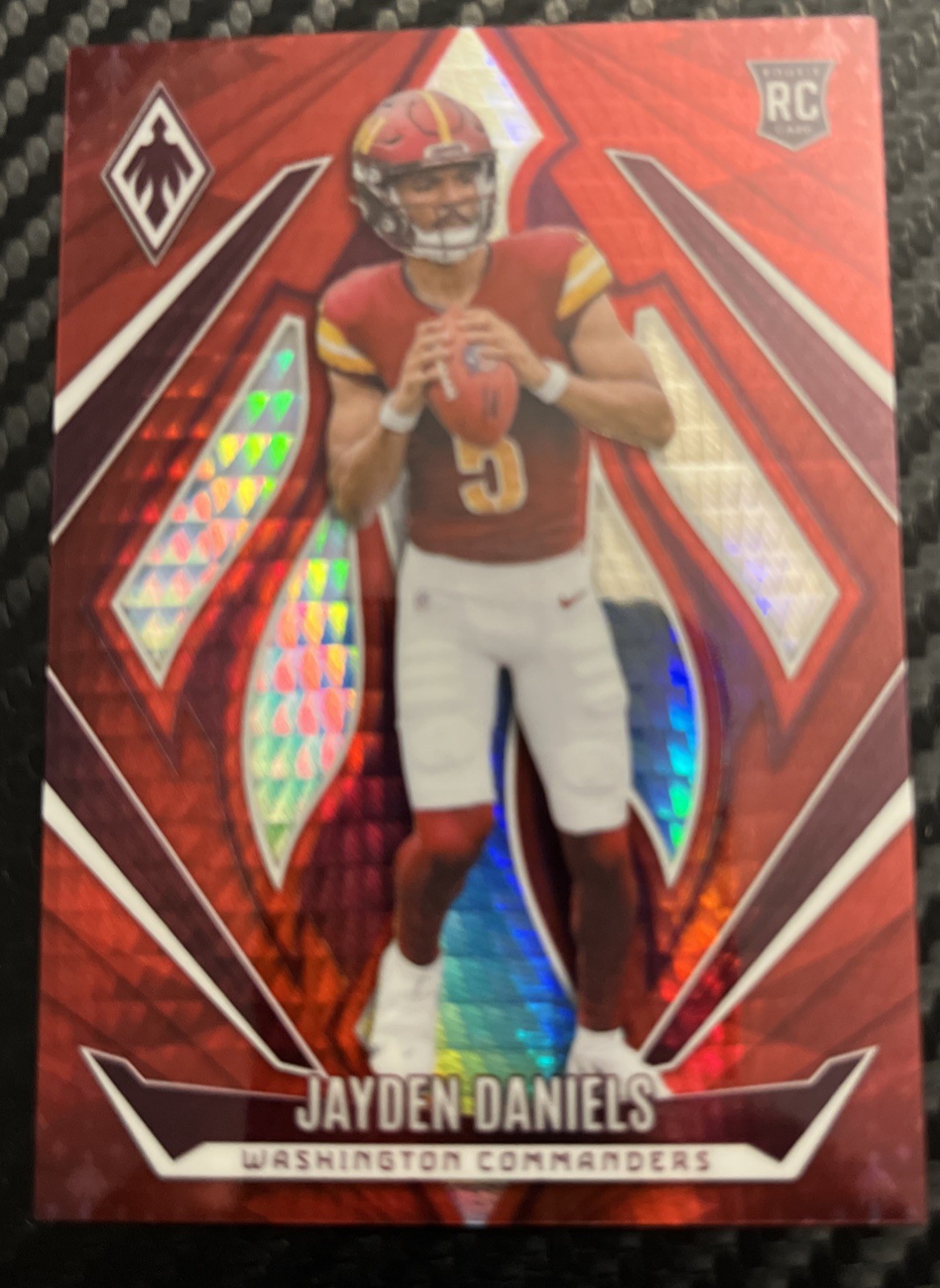 2024 Panini Phoenix - Rookies Jayden Daniels #198 Red Hyper /140 (RC)