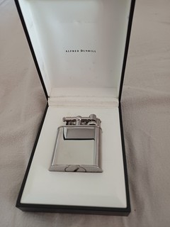 Dunhill lighter silver colour still in box.