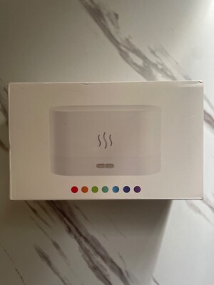AROMA Oil Diffuser Humidifier Noiseless and color changing 