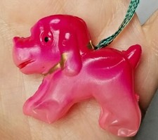 Vintage CELLULOID PINK DOG w/ Rattle 1.75" L x 1.5" T attached to finger ring