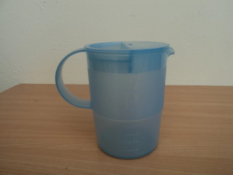 Pichet doseur Tupperware de 1/2Litre  gradué - Couvercle 25ml et 10ml. - Photo 3/4