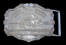 VTG. 1970'S LIVINGSTON WELLS  CO. BELT BUCKLE FOREIGN GOLD  DOMESTIC DEALERS