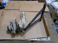Polaris 325 Trail Boss 2000 00 left front spindle a arm hub shock strut mount
