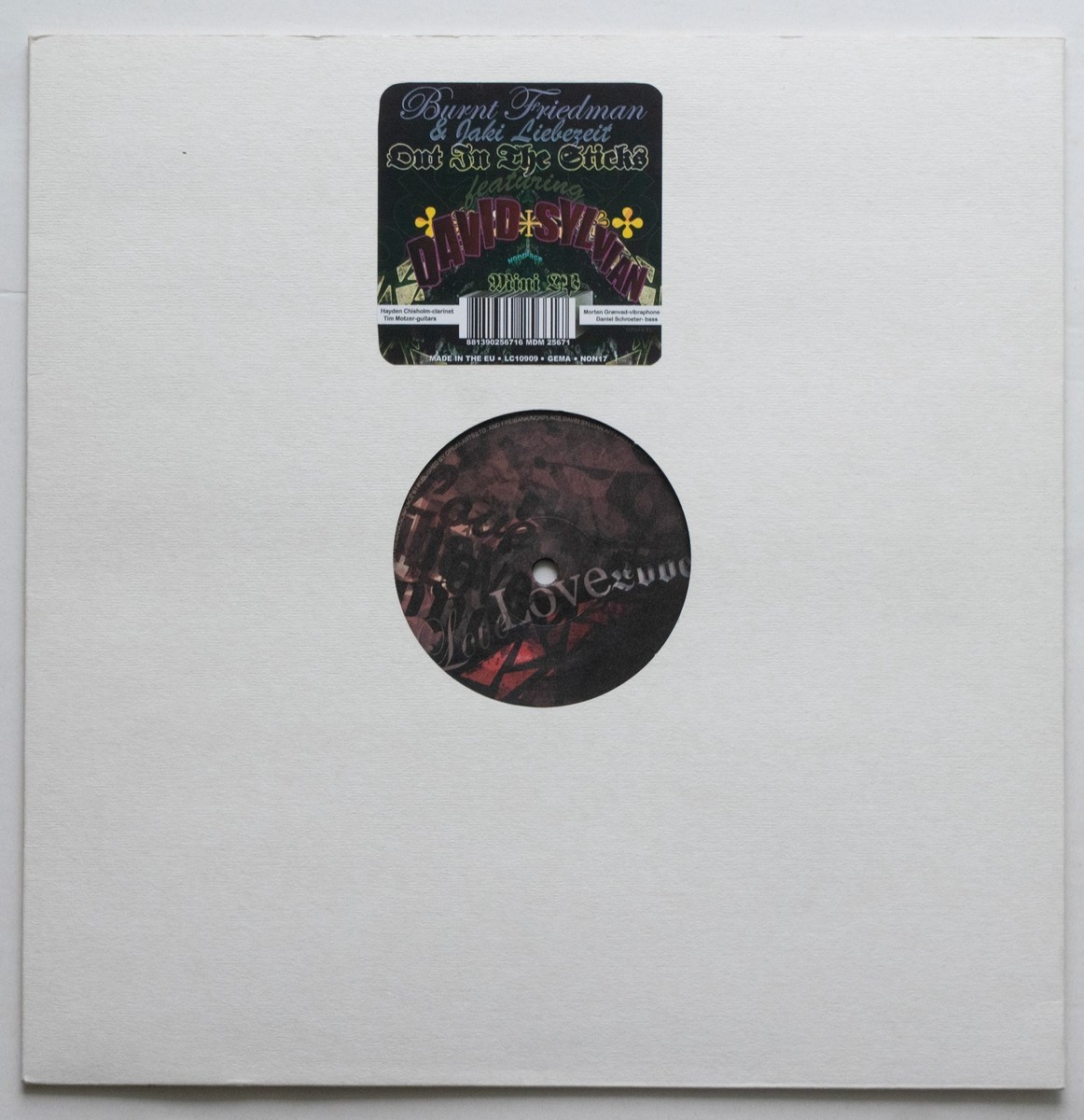 Burnt Friedman & Jaki Liebezeit Featuring David Sylvian - Out In 