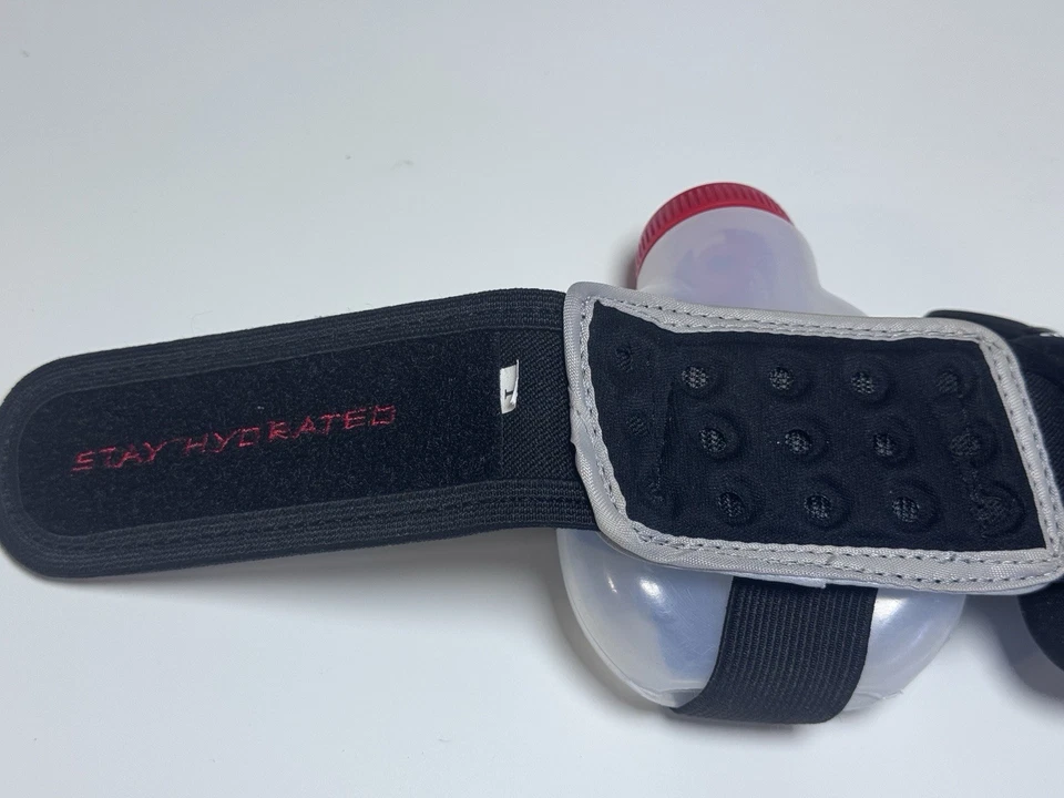 Cinturón de combustible cinturón de hidratación tamaño grande 4 botellas con cremallera bolsa de almacenamiento para entrenamientos. Foto 4 de 4