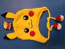 Pikachu Pok mon Knit Beanie Hat Earflaps Pokeball Tassels Bioworld Yellow NWT