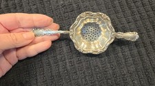 Antique Birks sterling silver tea strainer; no monograms