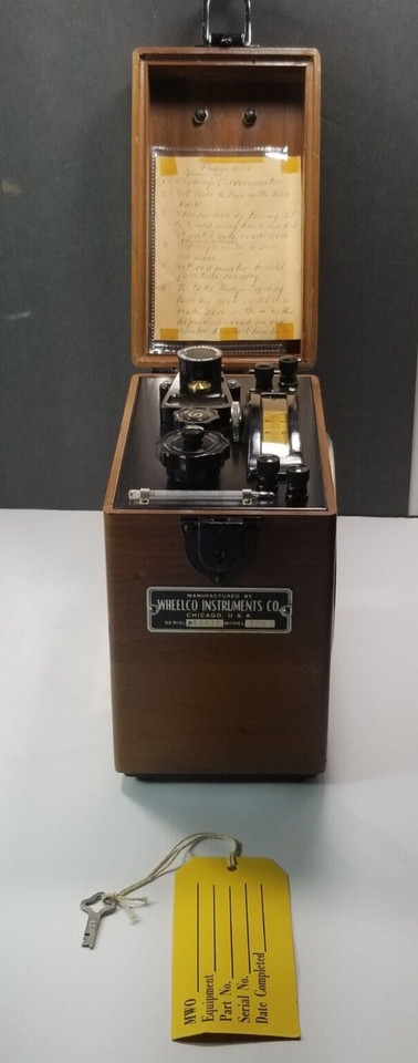 A WWII-era potentiometer in its original fitted case — a snapshot of wartime precision engineering you can actually hold.