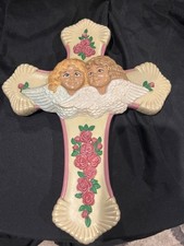 vintage ceramic wall hanging features twin angel cherubs on a cross