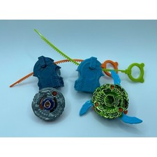 Lot of 2 Metal Beyblade w/ 2 Ripcord Launchers