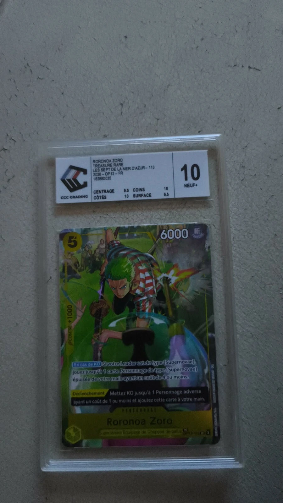 Recto de la carte Roronoa Zoro OP12-113 gradée CCC 10
