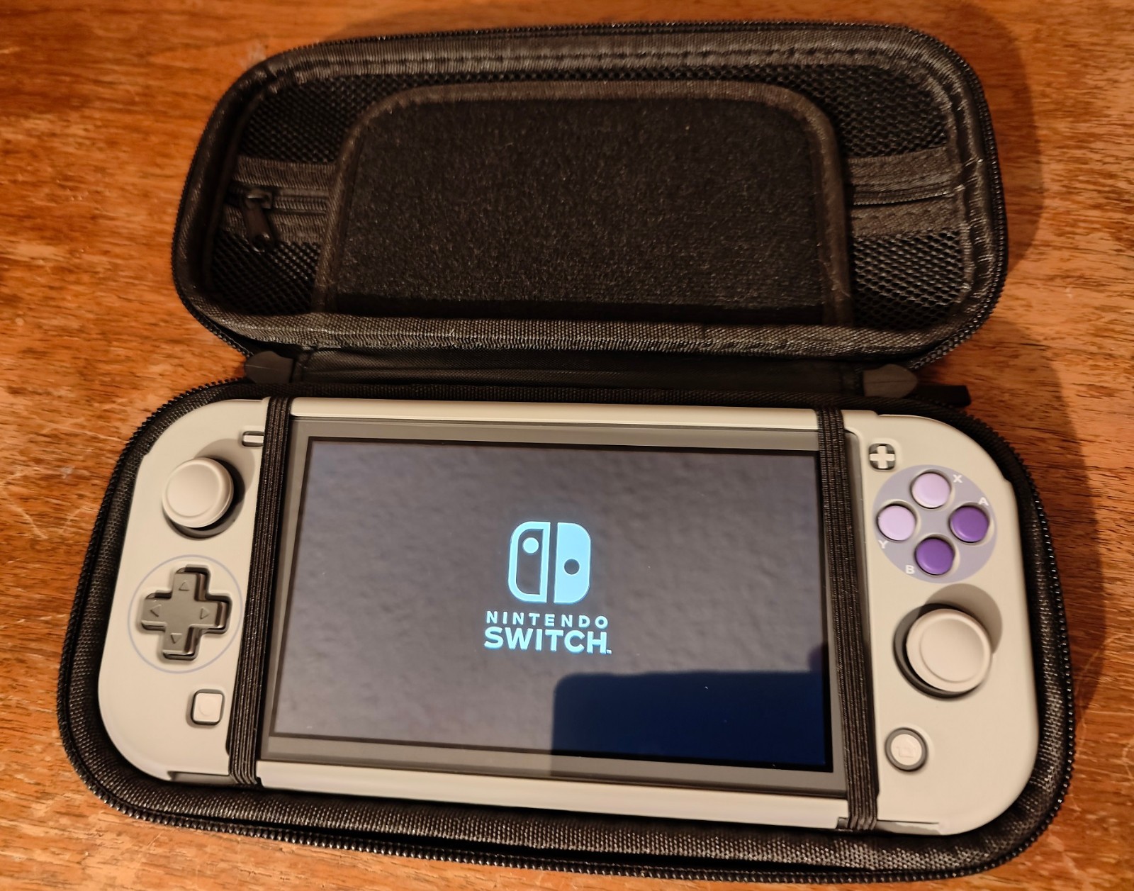 Nintendo Switch Lite 32GB console only - w/ SNES shell + carrying case