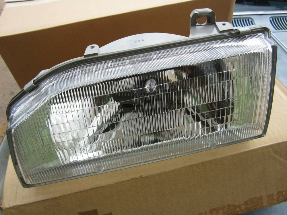 OEM 1988 1989 Mazda 323 Driver Side Left LH Front Headlight Lamp
