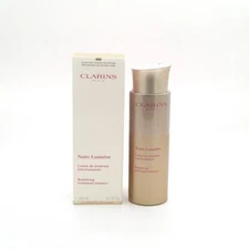 CLARINS Nutri-Lumiere Lotion Renewing Treatment Essence 6.7oz/ 200ml*NEW IN BOX*