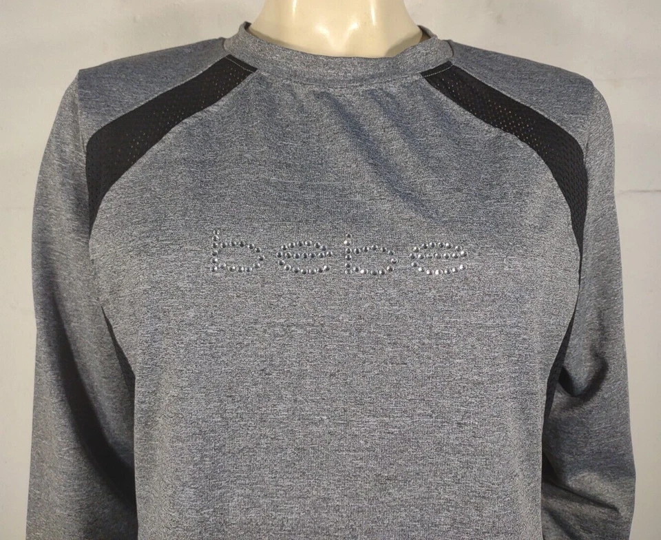 NUEVO SIN ETIQUETAS Bebe Sport negro gris ventilado manga larga top deportivo logotipo joya grande Foto 2 de 4