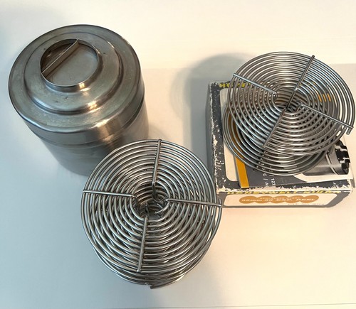 Nikor 35mm Stainless Steel Film Developing Tank with three 35mm reels. No cap.