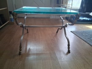 Vintage Glass table with an X Base and decorative ram's head