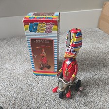 Original boxed 1970's clockwork duck on a bike tin toy ,TESTED/ WORKS