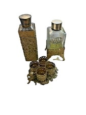 Gold filagree encased  perfume bottles and lipstick holder