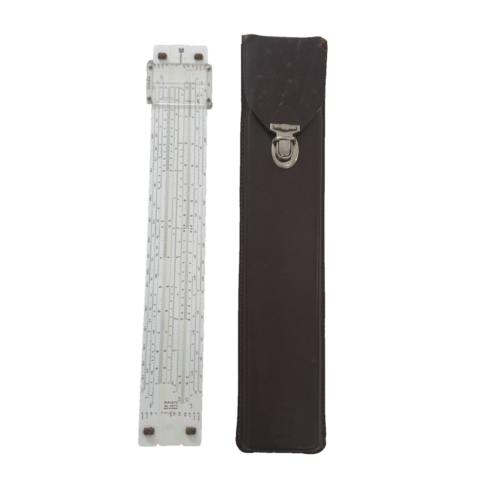 A German-made Aristo Multilog slide rule with a leather case — Aristo and Charvoz are respected precision brands, and this one has the looks and provenance to match.