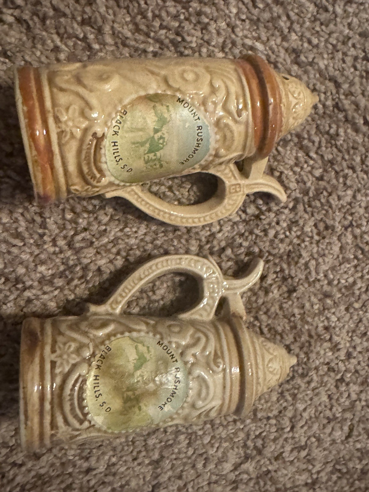 Mount Rushmore Black Hills SD ceramic stein salt & pepper shakers, embossed