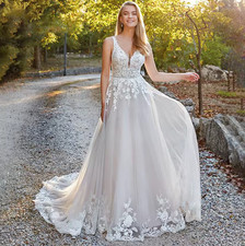 Deep V-Neck A-Line Wedding Dresses Appliques Backless Sleeveless Pleat