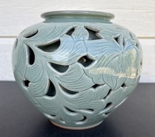 Korean Celadon Jar with Openwork Lotus Decoration 高麗青磁透彫蓮華花文壺