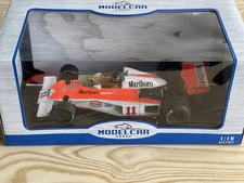 Model Car Group, 1976 James Hunt McLaren M23, No 11, with Marlboro Livery, 1/18.