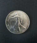 1986 .999 FINE SILVER EAGLE WALKING LIBERTY DOLLAR COIN IN VERY NICE CONDITION