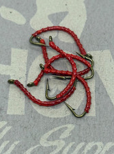 6 ea. Bright Red Pig Stickers size #10. A must have for your flybox.