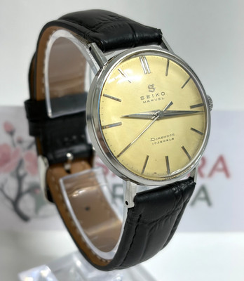 Vintage SEIKO Marvel 14012 Diashock 17J Hand Winding Gold Dial early1960 s Japan