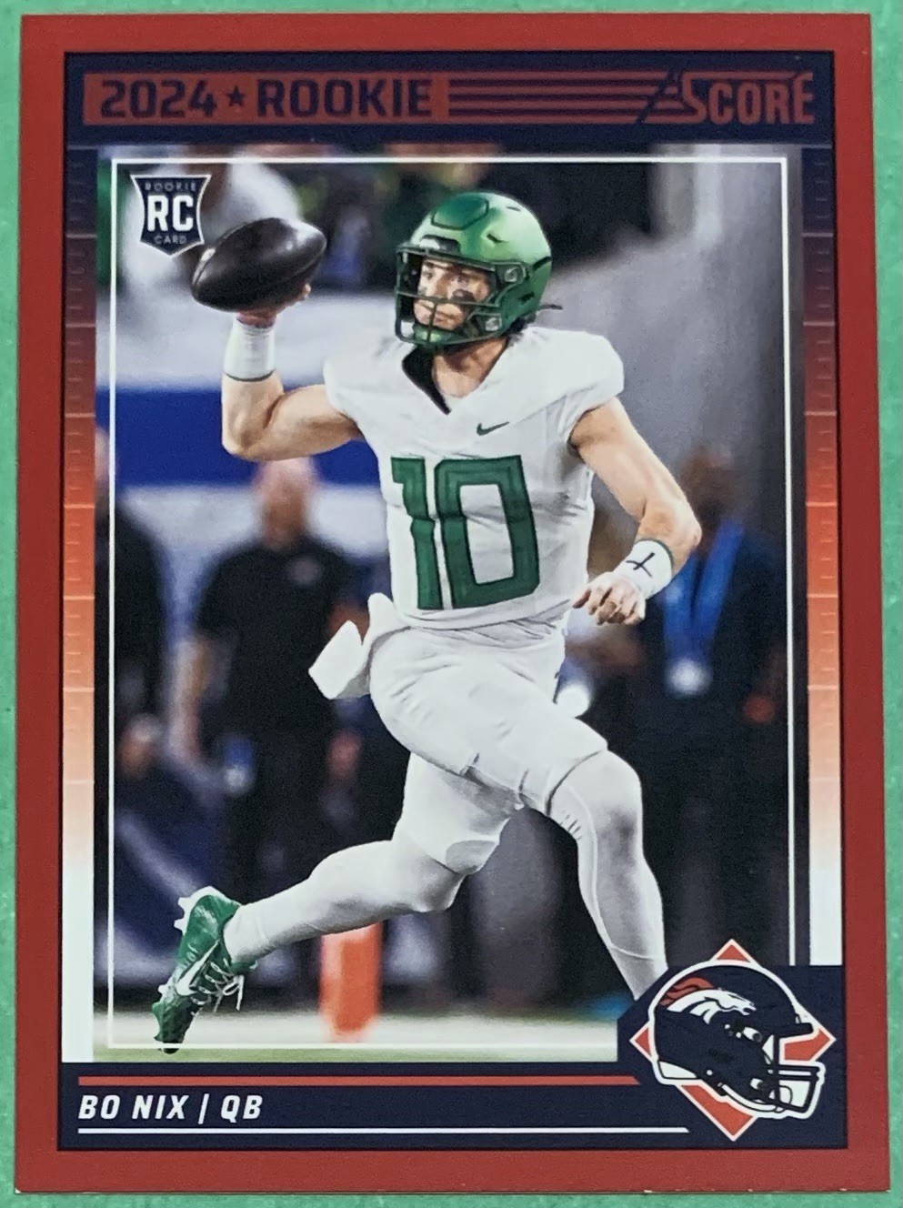 2024 Panini Score Football Bo Nix #332 Red Parallel Rookie Card (RC)