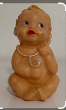 Mid 20th century molded rubber Baby playing with stethoscope squeeze toy