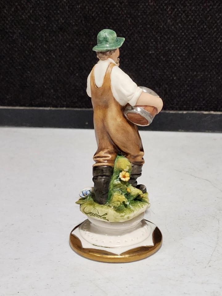 FIGURA DE HOMBRE CON PEZ Y GATO LUCIANO CAZZOLA PRÍNCIPE CAPODIMONTE ITALIA Foto 3 de 4