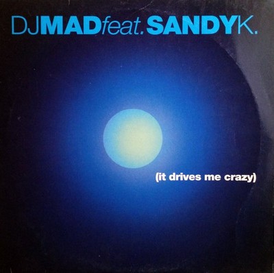 DJ Mad Feat. Sandy K. - It Drives Me Crazy (12'') (Very Good Plus (VG+)) - 398044