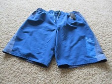 BNWT Nike Men's swimming trunks with drawstring, sheds water, keeps you dry