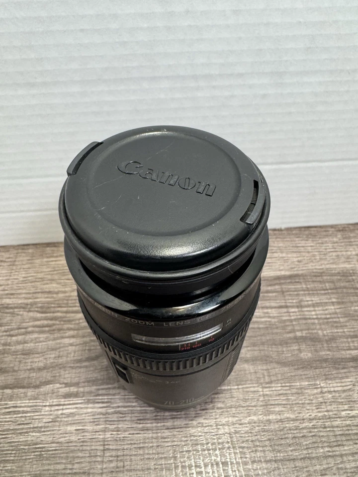 Lente zoom Canon EF 70-210 mm 1:4 con tapas de lente y teleconvertidor TC - DC58N 1,75x Foto 2 de 4