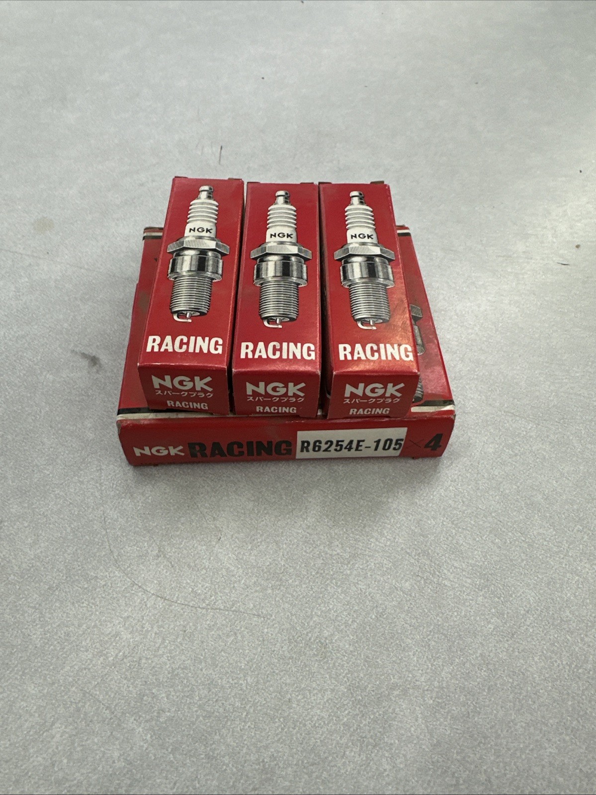 NOS NGK RACING SPARK PLUG R6254E-105 7 PACK
