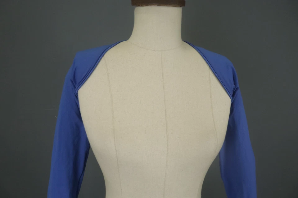 Top Boleros Wolford Azul Calce Regular Manga Larga Frente Abierto Recortado Encogerse de hombros Foto 2 de 4