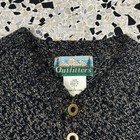 Black and gray vintage 80s 90s Outfitter’s Henley-style sweater with mountain logo and white printed text.