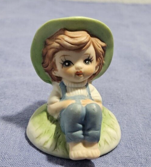Blue Eyed Boy Green Hat Blue Overalls Porcelain Figurine