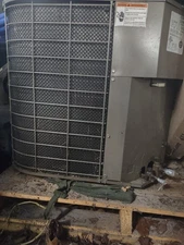 1.5 ton Heat Pump condenser unit and air handler w/ht st (1996-never installed) 