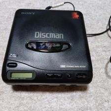 Sony Discman D-11 Portable CD Player DBB with Car Adapter and Music CD
