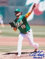 COLE IRVIN  OAKLAND A'S   ACTION SIGNED 8x10