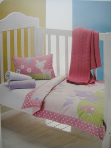 cot quilt and pillow