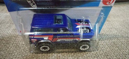 Hot Wheels 2023 Mainline NISSAN PATROL CUSTOM 20/250 nuovo di zecca - Foto 5 di 7