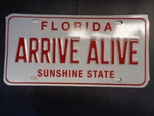  Florida ARRIVE ALIVE SUNSHINE STATE  Front license plate. State Issue.