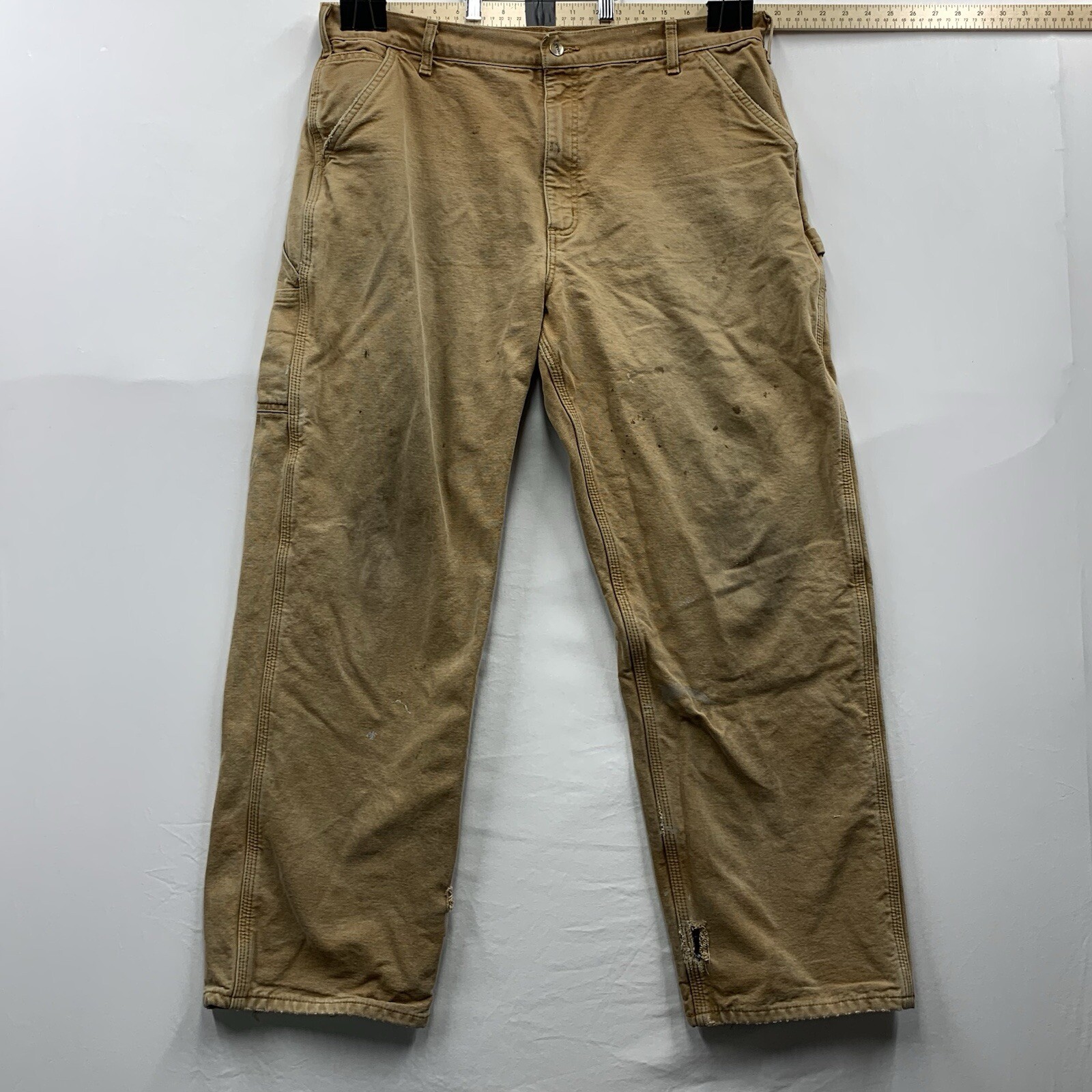 Брюки плотника Carhartt с фланелевой подкладкой 40 x 32 с искусственно состаренными отверстиями окрашенные B111 BRN