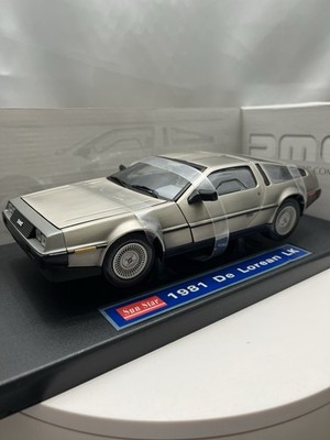 SUNSTAR  De Lorean DMC-12  1:18, SILVER BLACK, NEW AND SEALED.